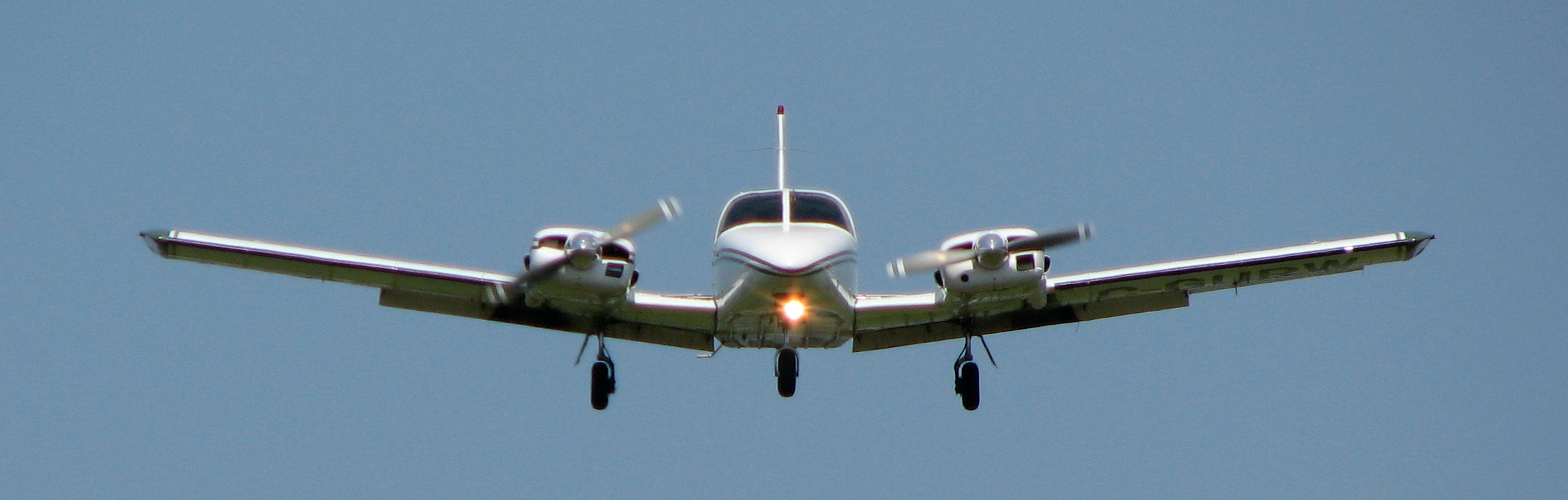 Langley Flying School's Piper Seneca, used for advanced flight training, on approach into Langley Airport.